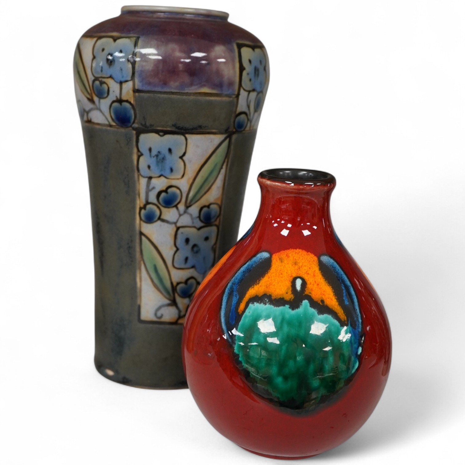 A Royal Doulton pottery vase and a Poole pottery Delphis vase, tallest 20.5cm